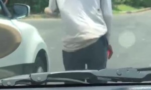 Panhandler Caught Hiding Arm
