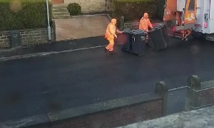 Rat Jumps Out of Bin and Startles Garbage Man