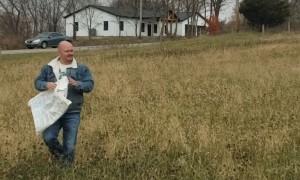 Man Pulls Feed Bag Off Goat's Head
