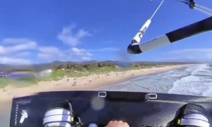 Kiteboarder Flies Beneath Windsurfer
