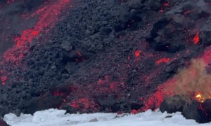 Skiing Next to the Mount Etna Lava Front