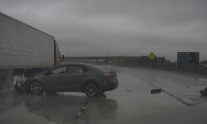 Allegedly Speeding Car Loses Control in Heavy Rain