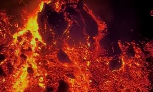 Lava Meets Snow On Mount Etna