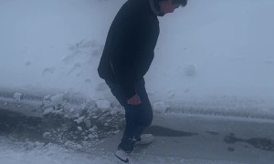 Man Fall Through Ice on Frozen Stream