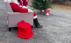 Dad Embarasses Daughters in Santa Costume
