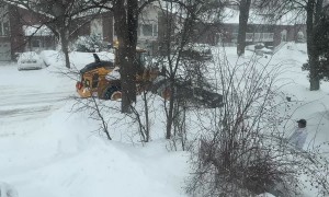Considerate Snow Plow Keeps Driveway Exits Clear