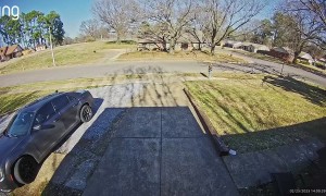 SUV Runs Over Mailbox