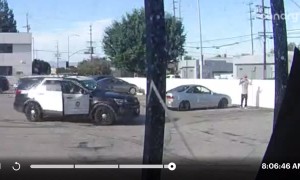 Police Officer Falls Out of Patrol Vehicle While Trying to Arrest Suspect