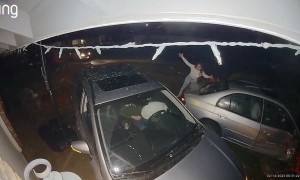 Allegedly Intoxicated Driver Crashes into Car Parked in Driveway