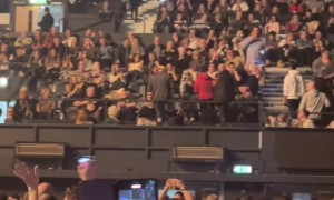 Man Entertains Stadium With Flashlight Game