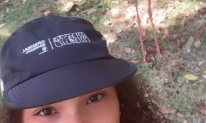 Not So Friendly Seriema Kicks Woman's Hat