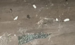 Golf Ball-Sized Hail Breaks Window and Cracks Windshield