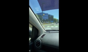 Motorized Chair Drives On New Zealand Road