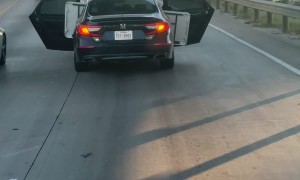 Honda Drives With Doors Open On Highway