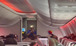Flight Attendant Raps Safety Instructions