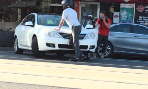 Motorcyclist Argues With Car Driver