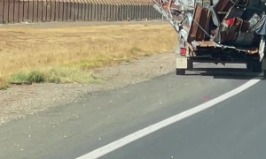 Suspiciously Swaying Load Of Towed Garbage