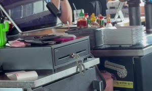 Bar Patron's Banner Displays Check Please