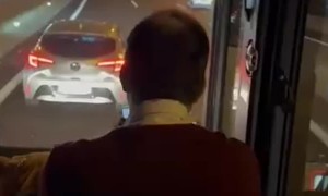 Car Blocks Two Buses On Highway