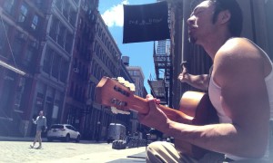 Store Manager Encourages Street Musician