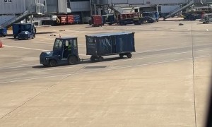 Luggage Gets Left Alone On Tarmac