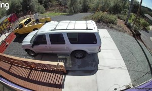 Man Loses Tire and Chases it Down a Steep Hill