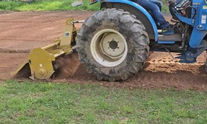 Helping Dad Plow the Garden