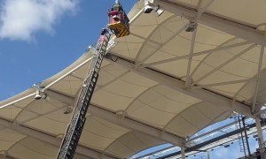 Fireman Rescue Parachutist Caught on Stadium During Rugby Game