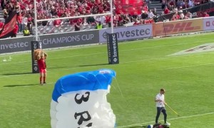 Parachutist Gets Stuck on Stadium Roof