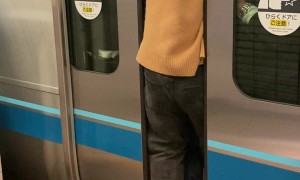Man Squishes Into Crowded Train Last Minute