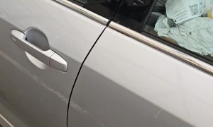 Car Filled To Brim With Filthy Garbage