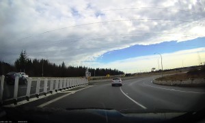 Dashcam Captures Car Swerving Onto MedianG