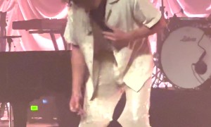 Loose Thread Ties Sparkly Pants Together At Knees