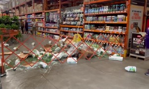 Pallet of Products Fall From Top Shelf