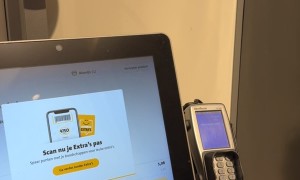 Cat Blocks Register At Supermarket Checkout