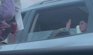 Giving a Stranger Her Sweater