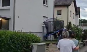 Man Escapes From Fire by Jumping To Trampoline