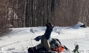 Snowmobile Wipeout Exposes Rear