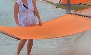 Vacationing Woman Flipped By Beach Hammock