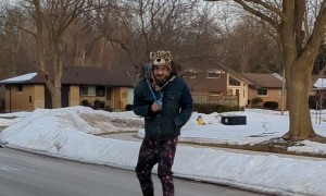 This Cat Loves Riding Their Human Around Town