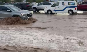 Ambulance Navigates Flooded Streets in Fort Mohave, Arizona