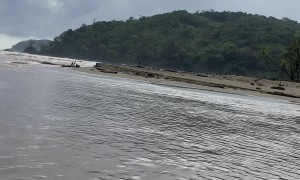 Boat Has Bumpy Exit Over Choppy Waves