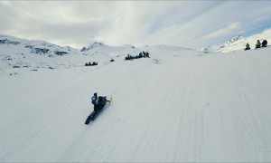 Competitor Crashes At Snowmachine Hill Climb