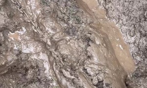 Tire And Chain Used To Clean Drainage Pipe