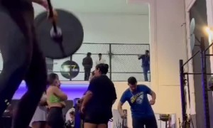 Weightlifter Drops Barbell on Her Back