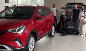 Man Uncovers Car and Accidentally Covers Little Girl with Sheet