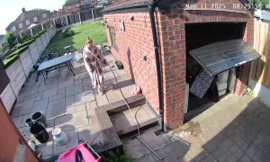 Woman Bonks Head On Open Garage Door