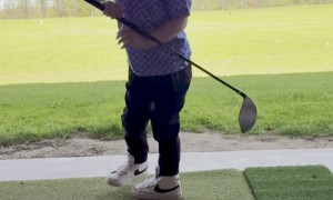 Boy Hits His First Golf Ball