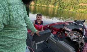 Dad Calmly Rescues Son Who Falls Into Lake Water During Fishing Trip