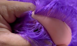 Sewing Curly Purple Hair On Toy Doll